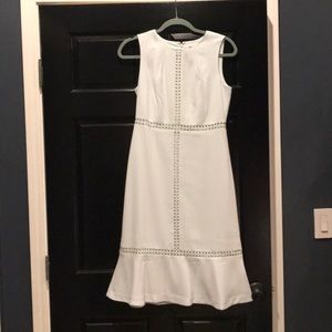 New with tags. Teal flounce dress, size 2